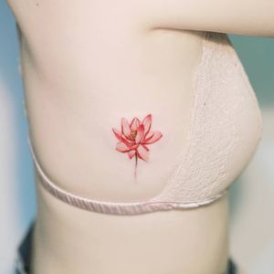 A lotus flower by SION (@tattooistsion) #flowertattoo #floraltattoo #Korea #KoreanArtist #tattooistsion #colortattoo #flower #flowers #oriental #lotustattoo #minitattoo #smalltattoo 